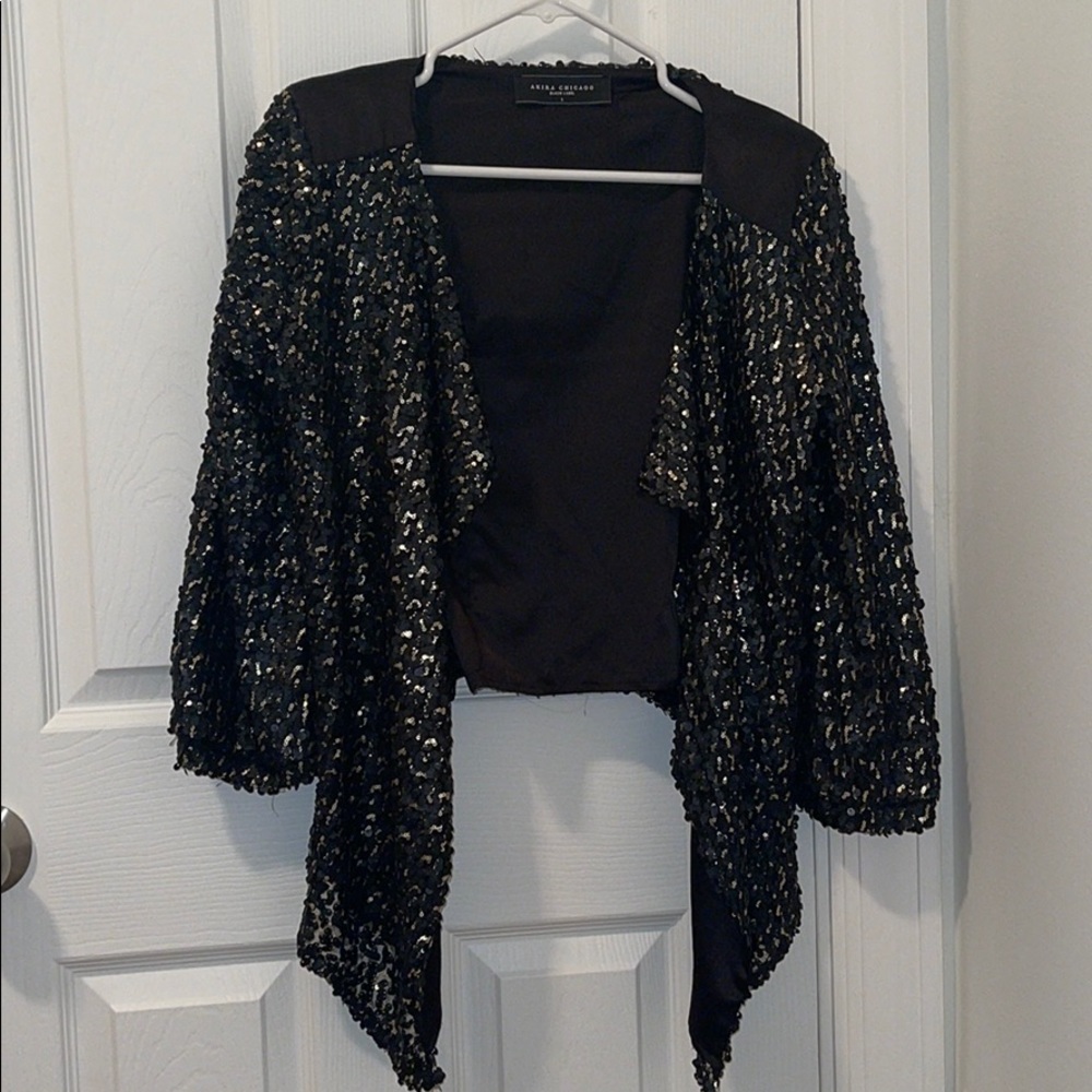 Black and gold sequin jacket.